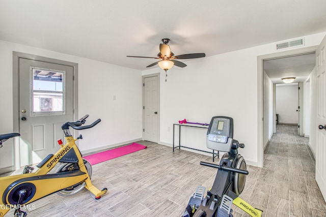 workout room with ceiling fan