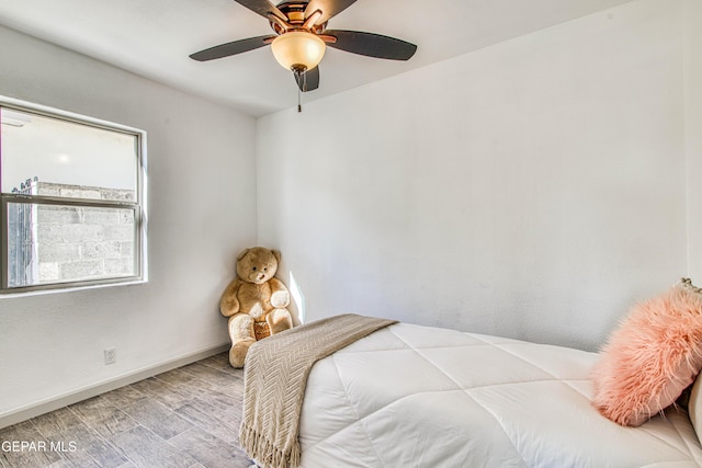 bedroom featuring ceiling fan