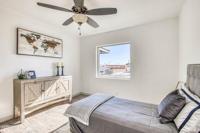 bedroom featuring ceiling fan and wood-type flooring