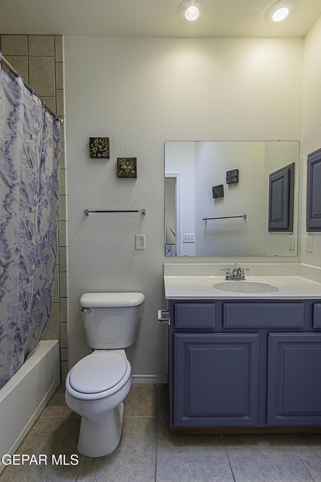 full bathroom with toilet, vanity, tile patterned flooring, and shower / bathtub combination with curtain