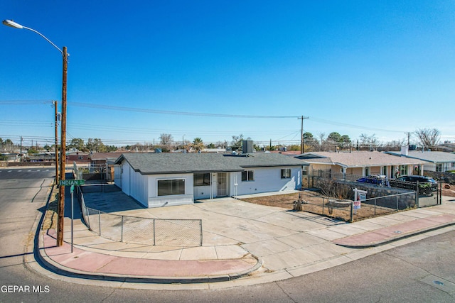 single story home featuring cooling unit