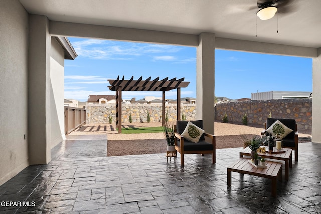 view of patio / terrace featuring ceiling fan