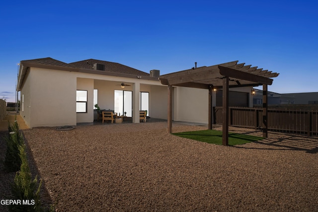 rear view of property with outdoor lounge area, a patio area, a pergola, and ceiling fan