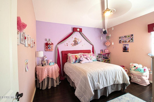 bedroom with hardwood / wood-style flooring and ceiling fan