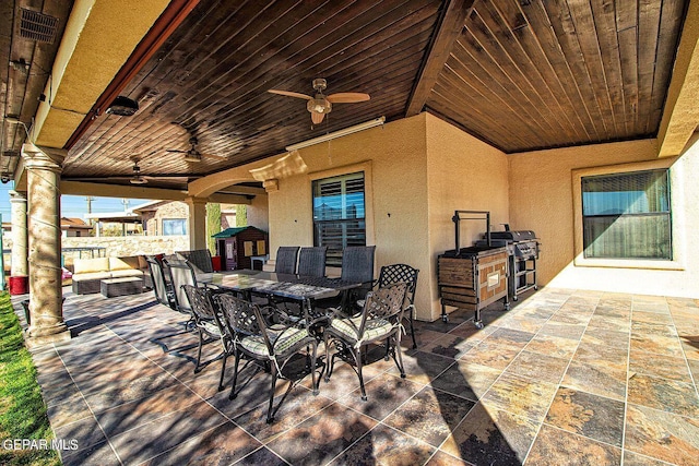 view of patio / terrace featuring area for grilling and ceiling fan