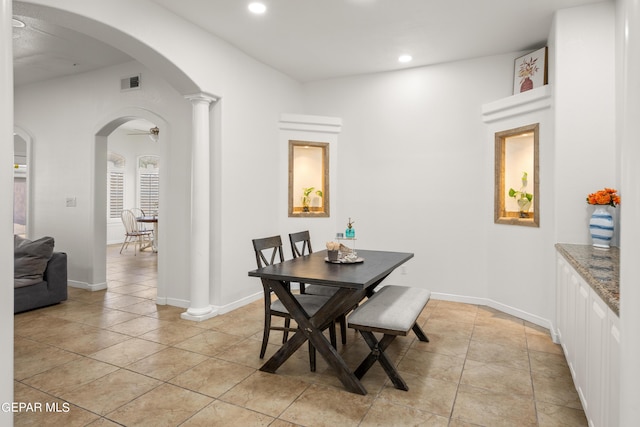 dining area featuring ceiling fan and light tile patterned floors