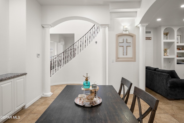 dining space featuring built in features