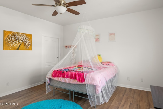 bedroom featuring hardwood / wood-style floors and ceiling fan