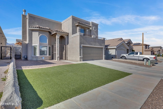 view of front of property with a balcony, a garage, and a front lawn