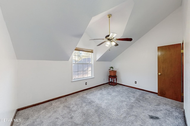 additional living space featuring lofted ceiling, ceiling fan, and carpet