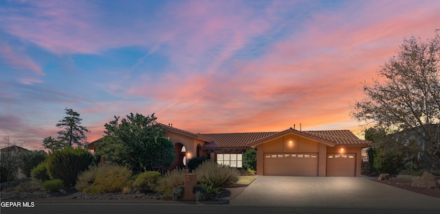 view of front of home with a garage