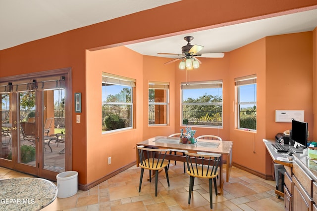 dining space with ceiling fan