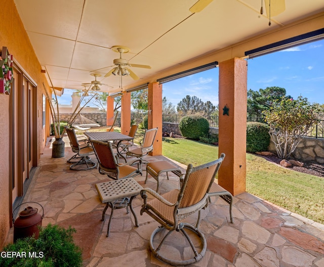 view of patio with ceiling fan