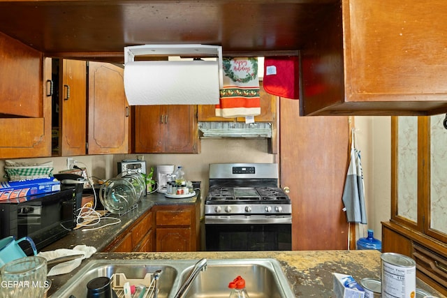 kitchen with stainless steel gas range