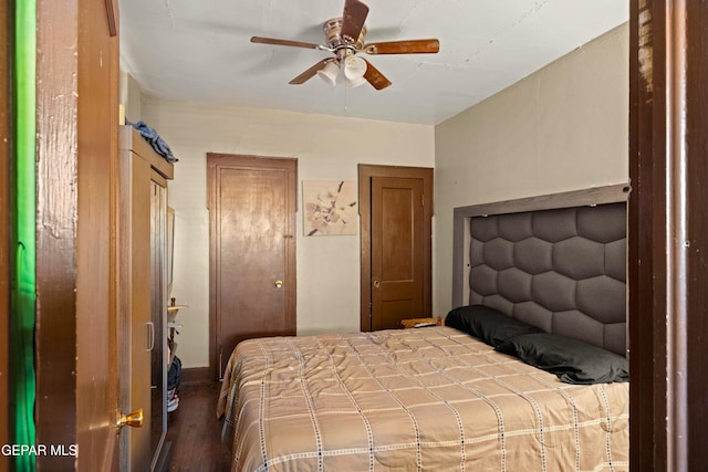 bedroom featuring ceiling fan and hardwood / wood-style floors