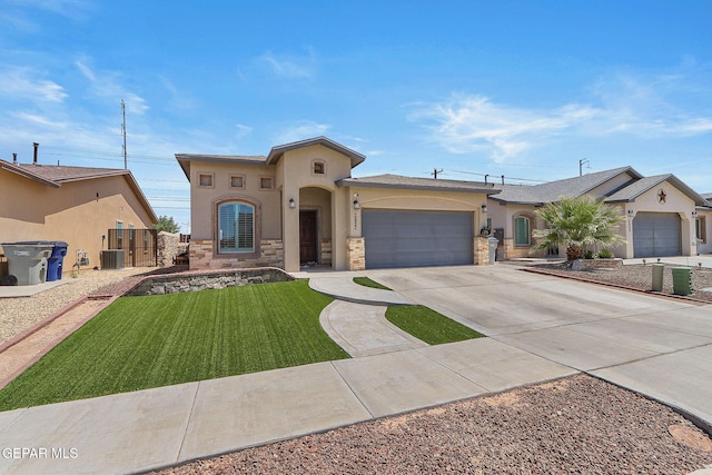 view of front facade with a front yard and a garage