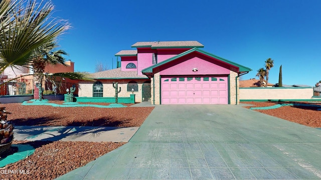 view of front of home with a garage