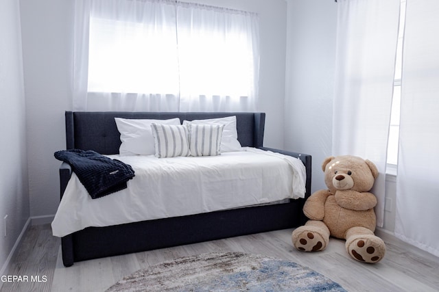 bedroom featuring hardwood / wood-style flooring