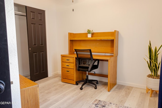 office space featuring light hardwood / wood-style floors