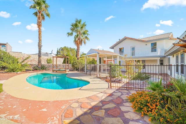 view of swimming pool featuring a patio