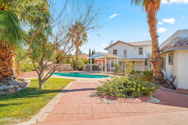 view of swimming pool with a patio area