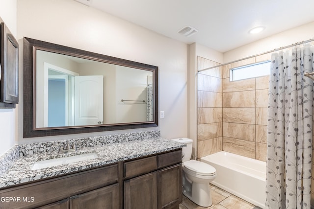 full bathroom featuring toilet, vanity, and shower / tub combo with curtain