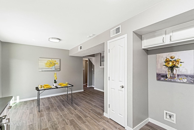 hallway featuring hardwood / wood-style floors