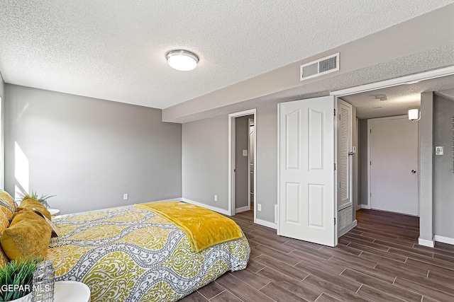 bedroom with a textured ceiling