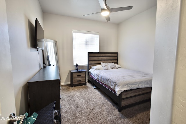 bedroom featuring ceiling fan and carpet floors