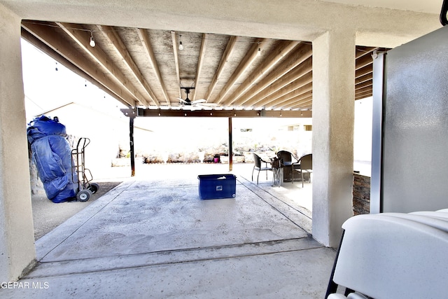 view of patio / terrace featuring ceiling fan