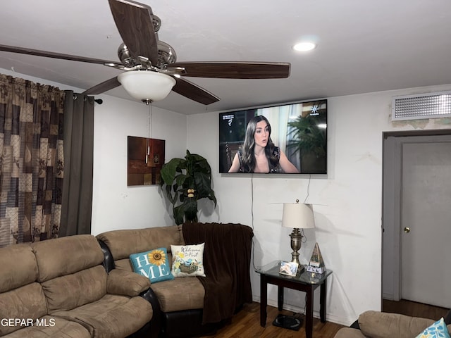 living room featuring ceiling fan and hardwood / wood-style floors