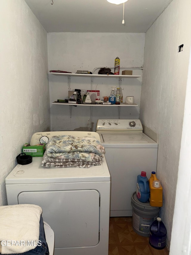 washroom featuring independent washer and dryer and parquet flooring