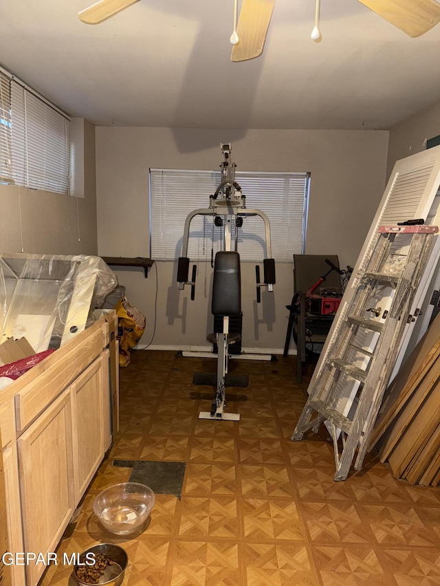 exercise room with parquet flooring