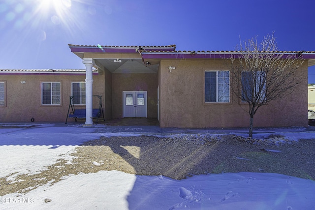 view of snow covered property