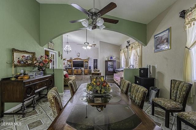 dining room featuring vaulted ceiling and ceiling fan