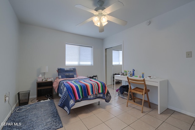 bedroom with light tile patterned flooring and ceiling fan