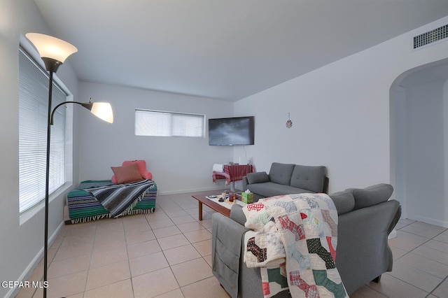 living room with light tile patterned floors