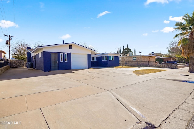 single story home with a garage