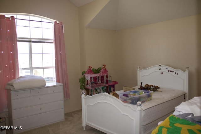 bedroom with light colored carpet