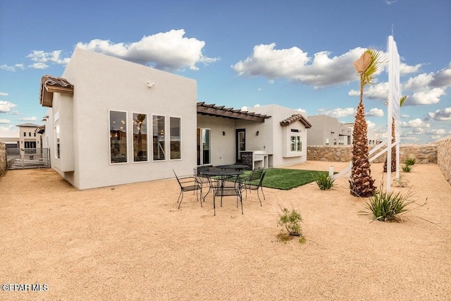 back of property featuring a patio