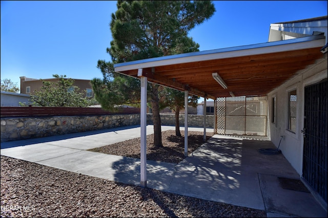 view of patio with a carport