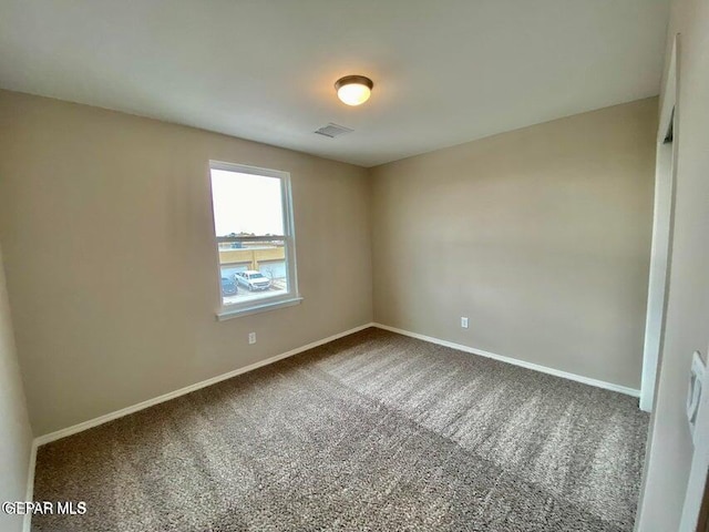 view of carpeted spare room