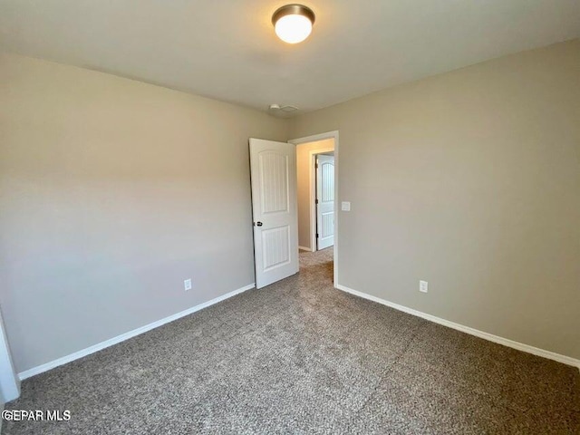 view of carpeted spare room