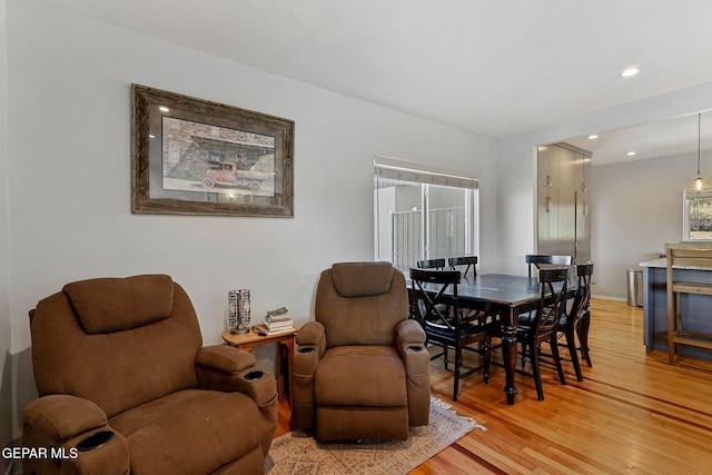 dining room with hardwood / wood-style flooring