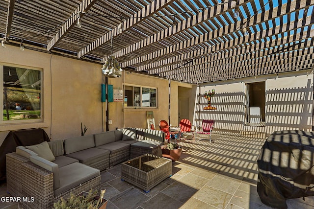 view of patio with a pergola and an outdoor living space