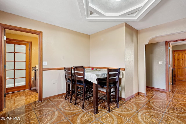 dining area featuring tile patterned floors