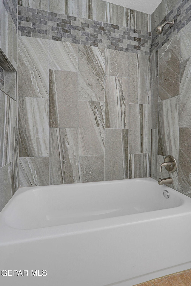 bathroom with a washtub