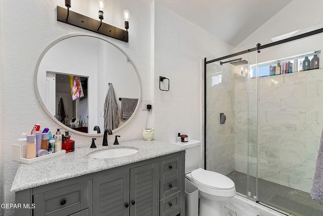 bathroom with toilet, an enclosed shower, vaulted ceiling, and vanity