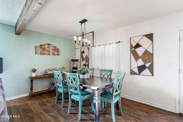 dining space with an inviting chandelier and beam ceiling