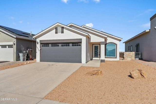 ranch-style home with a garage